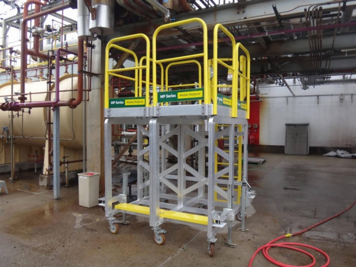 MP series rolling work platform with an access ladder and Yellow Gate 705x529 Rolling Stairs and Work Platforms